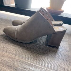 Worn once heeled mules. Tan colored and size 8.